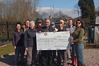 Tony Gardner from The Rotary Club of Middleton (centre) with the The Croft Community Garden Society - 13 April 2015